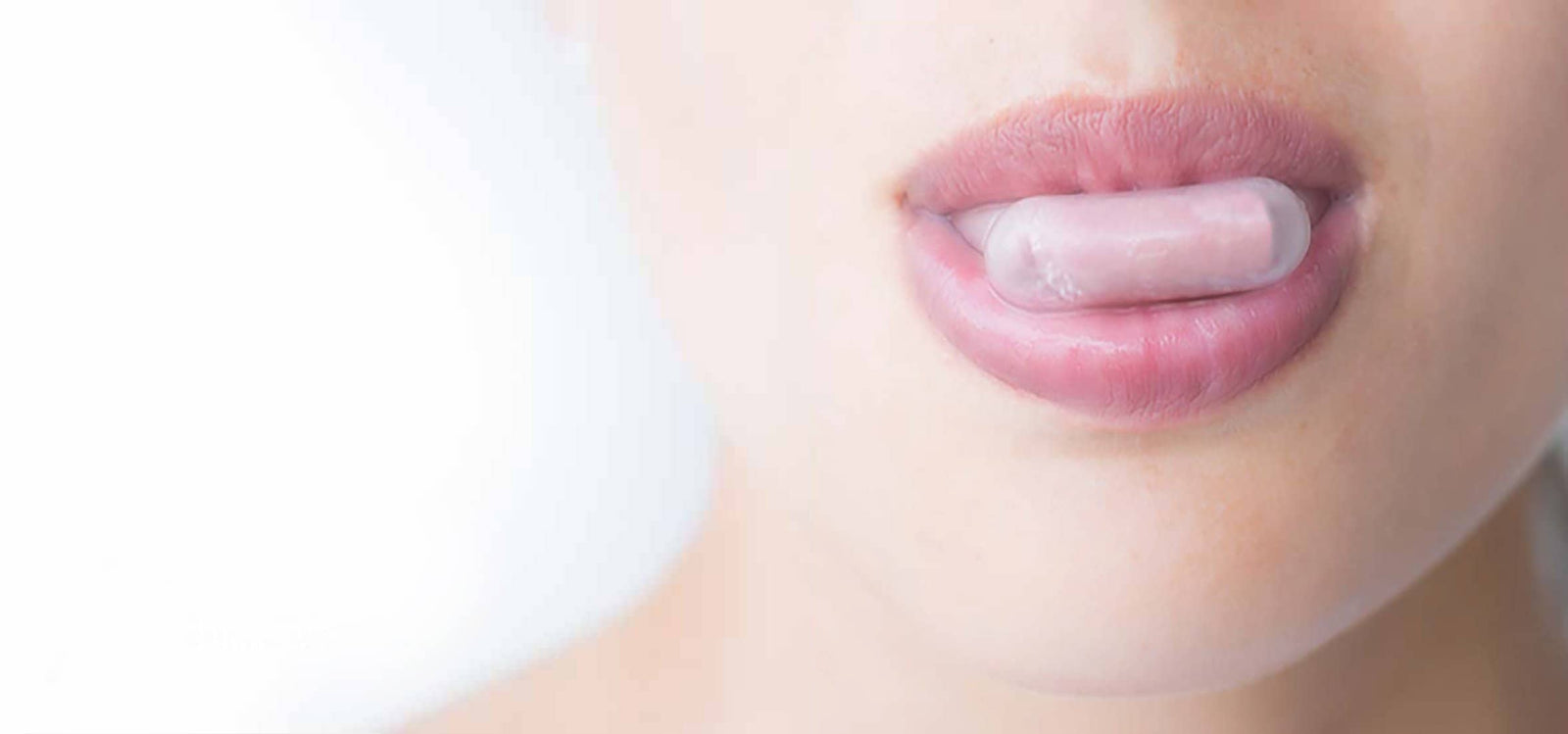 women's tongue shown wearing snore solution mouthpiece