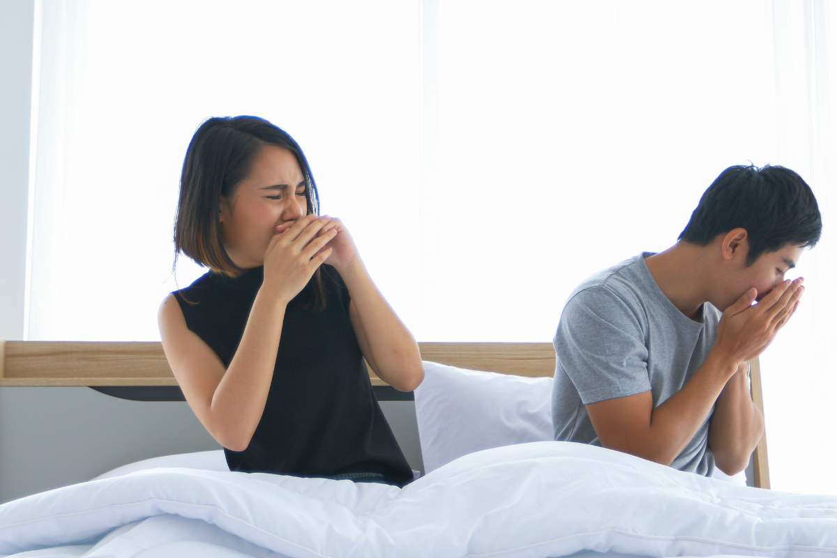 Couple waking up to bad breath